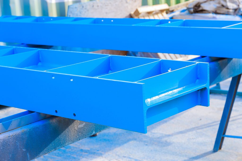 Blue powder coated metal shelving.