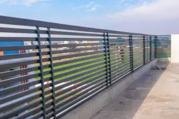 Coated metal fencing.